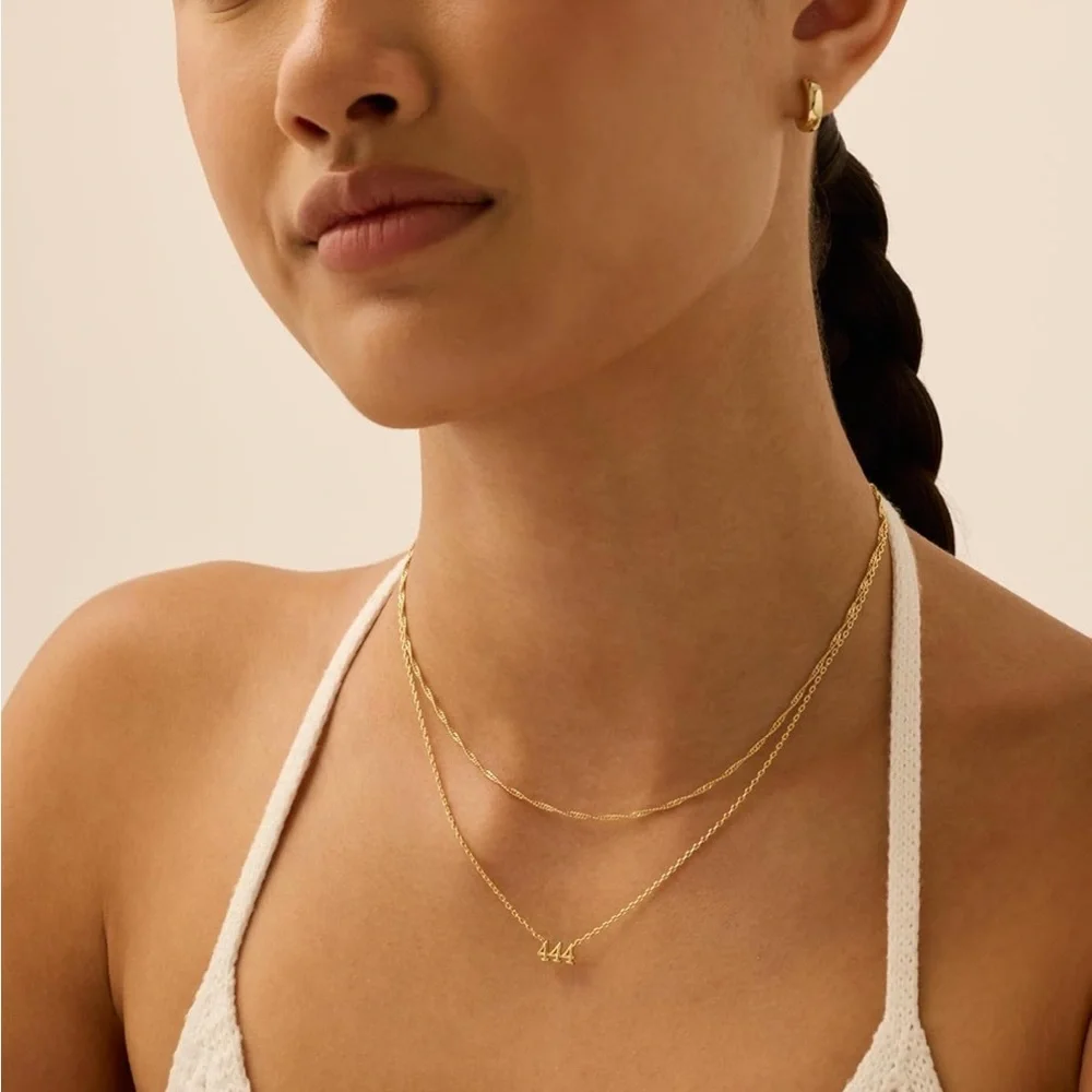 555 Elegant Gold Necklace with Number Pendant